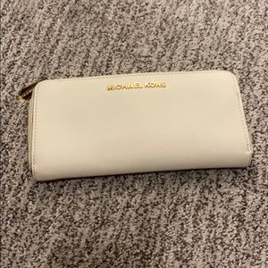 Michael Kors cream colored wallet